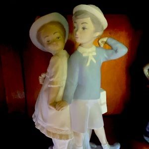 Lladro boy and girl